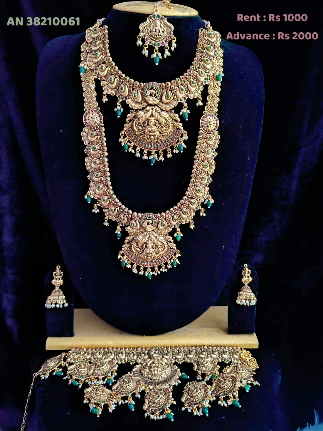 AN 38210061 Antique Peacock Lakshmi Layered Necklace Set on rent - Antique Gold, Ruby Red, Emerald Green, Pearl White