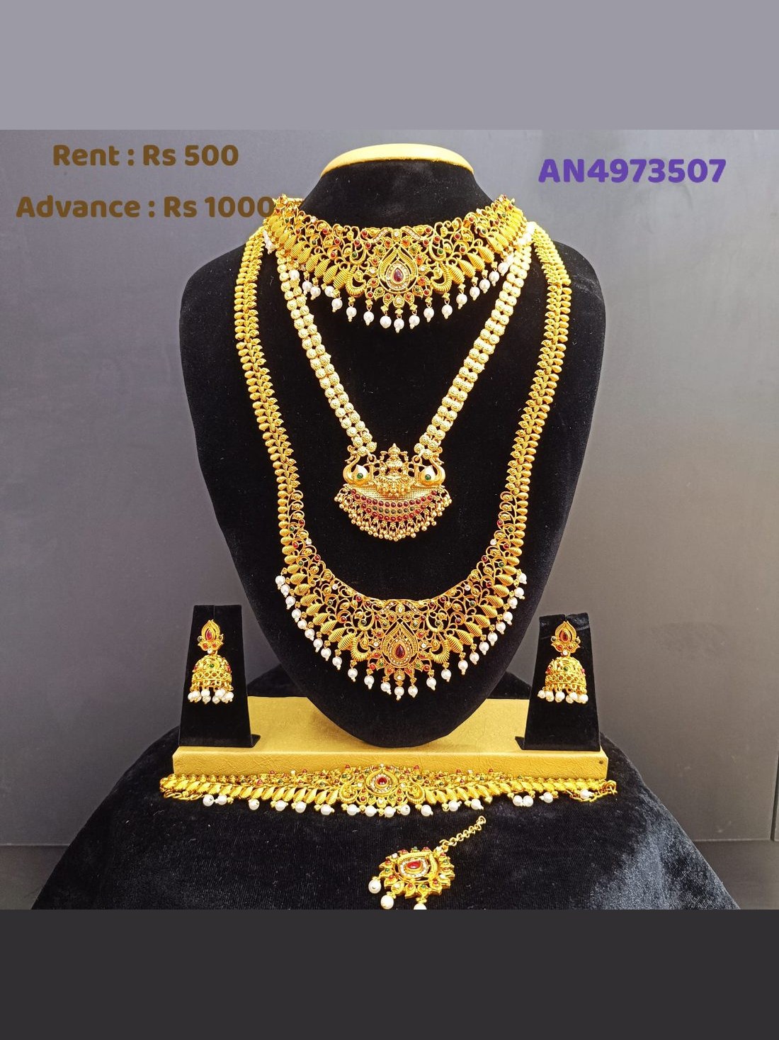 AN4973507 Classic Pearl Drop Bridal Haram on rent - gold bead haram, Lakshmi pendant, jhumka earrings, vanki, maang tikka