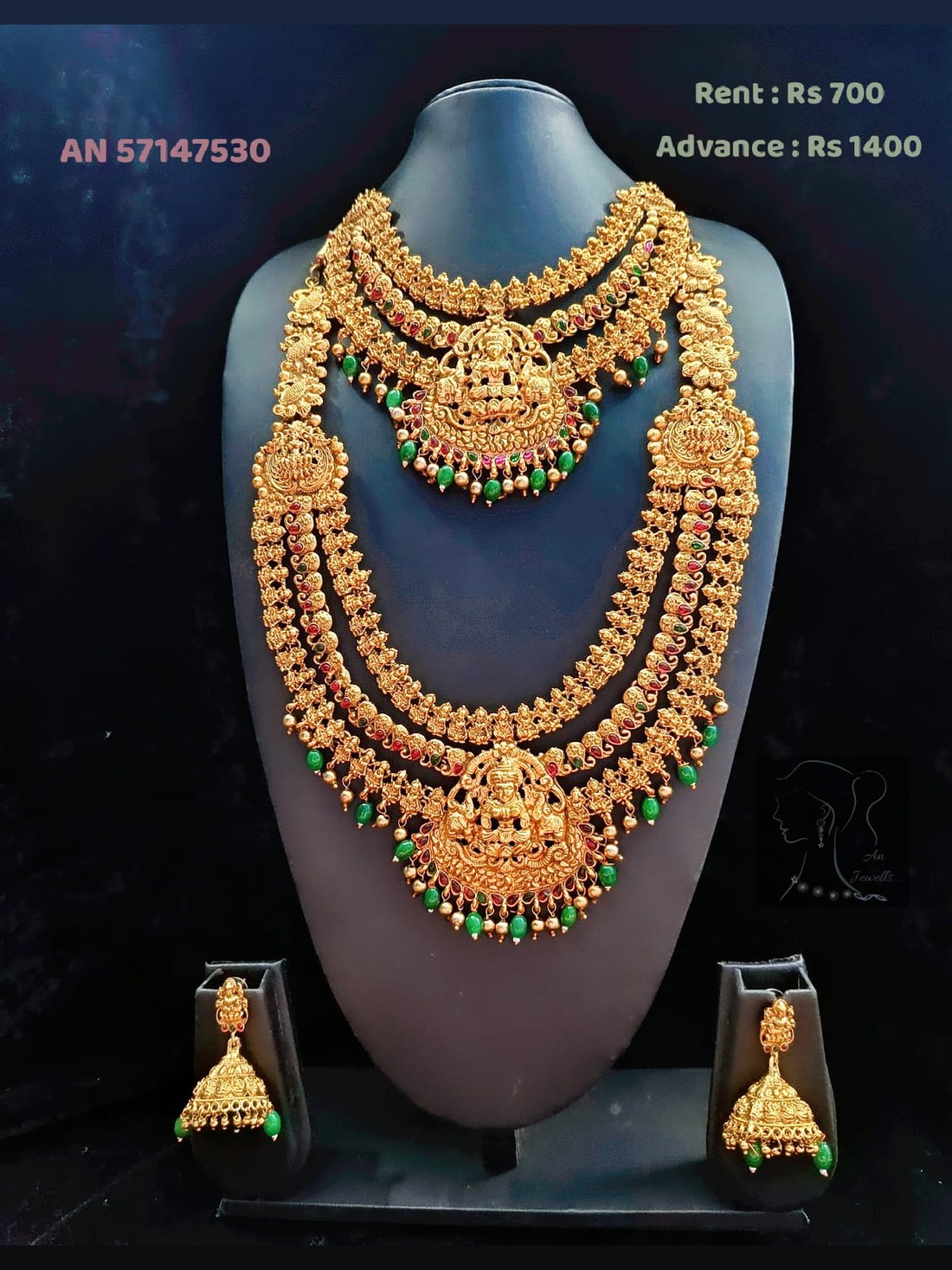 AN 57147530 Antique Gold Triple Lakshmi Haram with Green Bead Drops on rent - Antique Gold, Emerald Green, Ruby Red