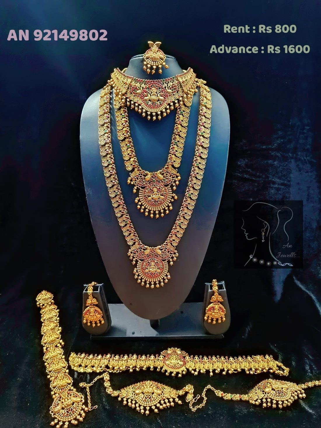 AN 92149802 Royal Triple Layer Temple Bridal Set on rent - antique gold Lakshmi pendant necklace, jhumka earrings, maang tikka, vanki, waist belt